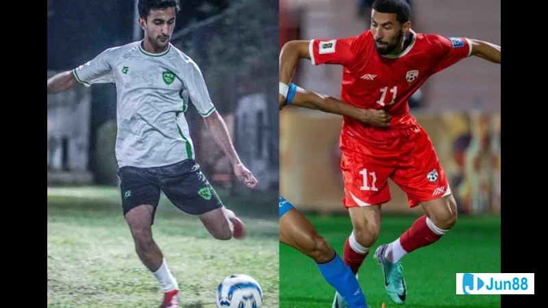 Cầu thủ Belarus U17 đi bóng qua cầu thủ Na Uy U17 trong trận đấu bóng đá