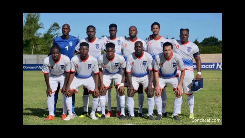 Cầu thủ từ đội Dominica đang chiến đấu với cầu thủ từ đội Sint Maarten. Cầu thủ từ đội Dominica đang chiến đấu với cầu thủ từ đội Sint Maarten.